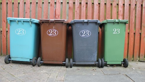 Rubbish bins in a row