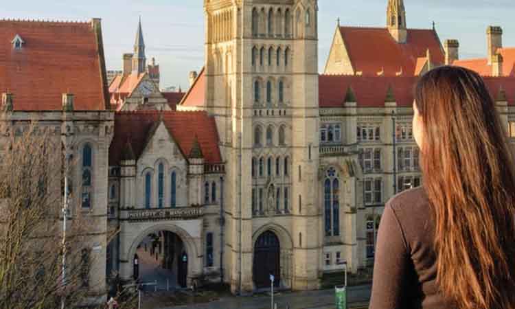 woman looking at the University building