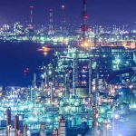 night view of well-lit refinery or factory